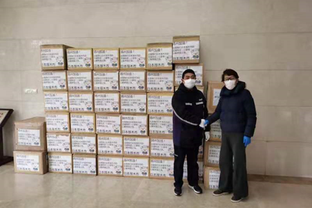 Zhang Jiabo overseeing the shipment of medical masks