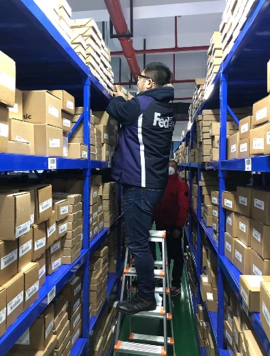 Zhang Hua preparing for shipment