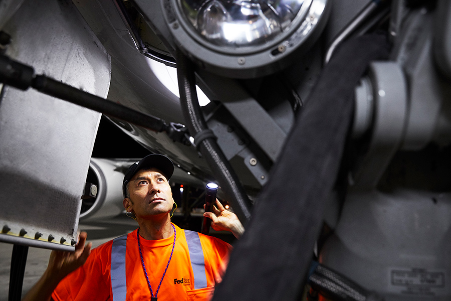 FedEx engineer shines torch into plane engine