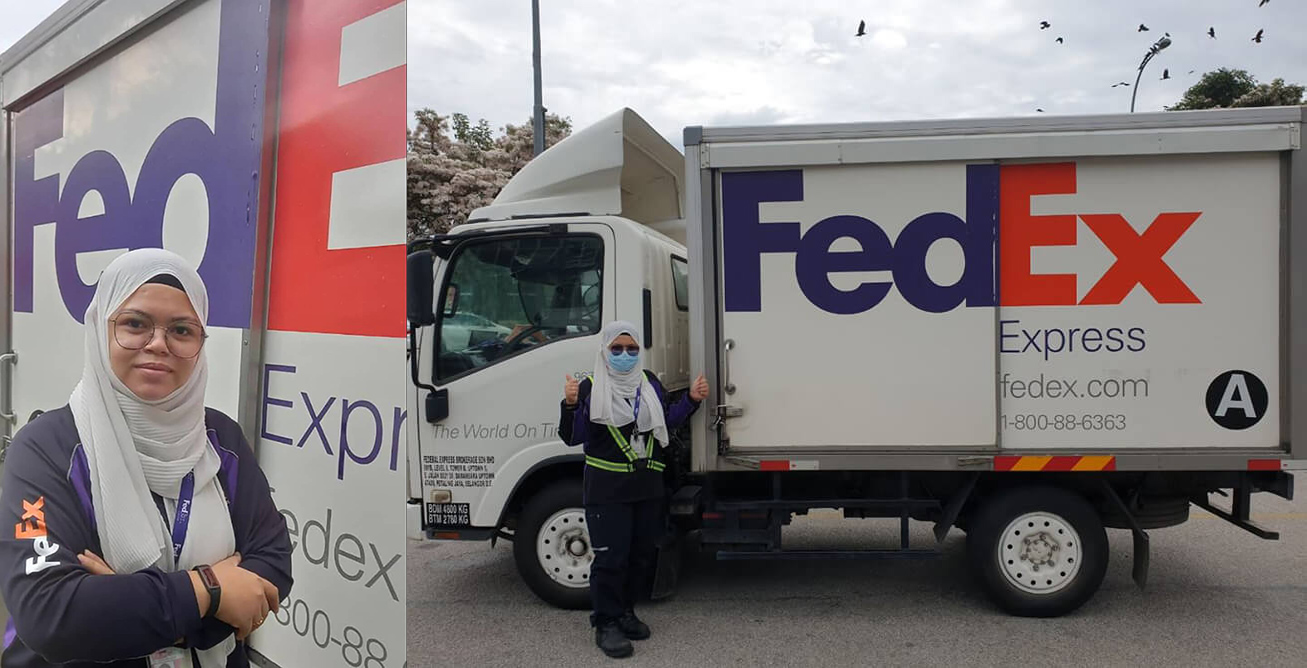 Malaysian woman stands next to a FedEx truck