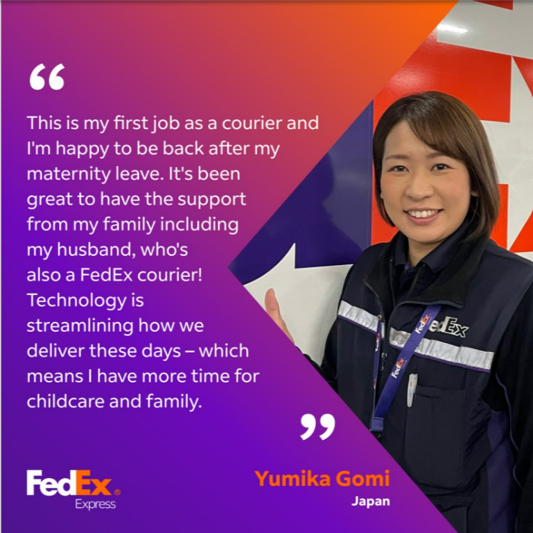 Female FedEx courier smiles