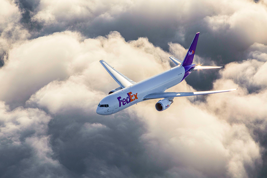 FedEx plane in the sky