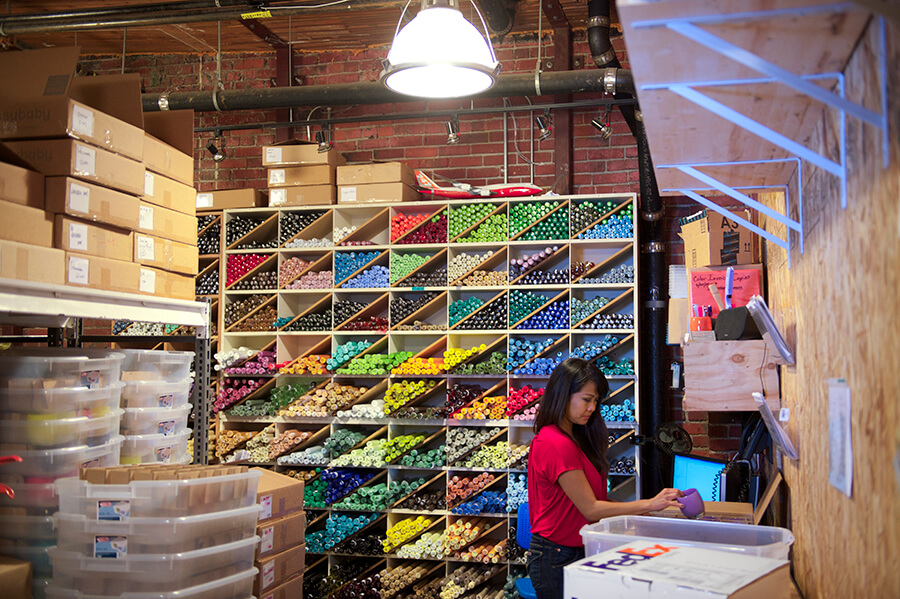 Woman in shop working on deliveries