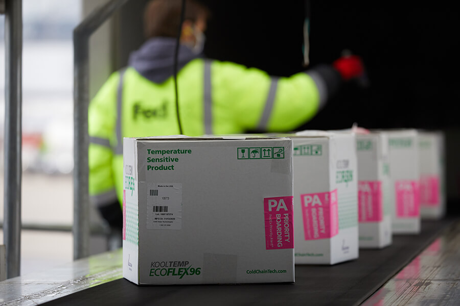 FedEx staff arranges shipment for vaccines