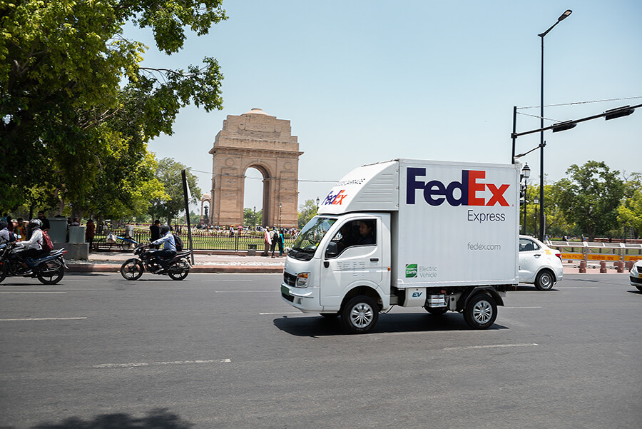 FedEx mini electric van on street in India