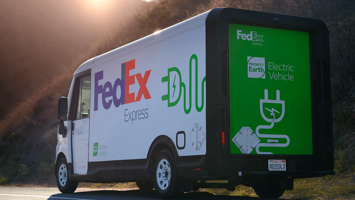 FedEx electric vehicle drives down the road