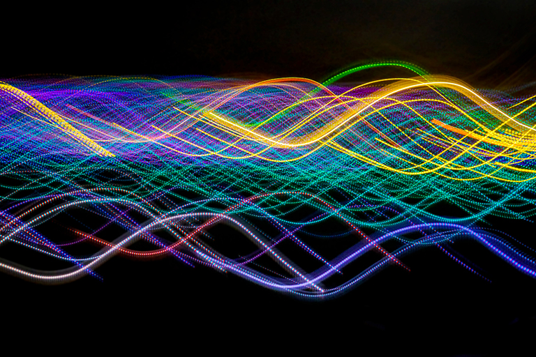Multiple rainbow-colored strands of light
