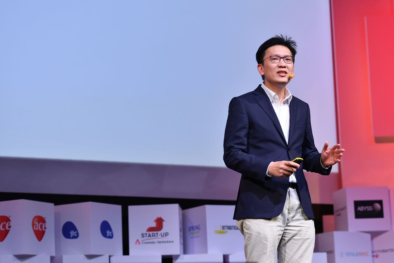 Dr Tan Min-Han, CEO of Lucence delivers speech on-stage