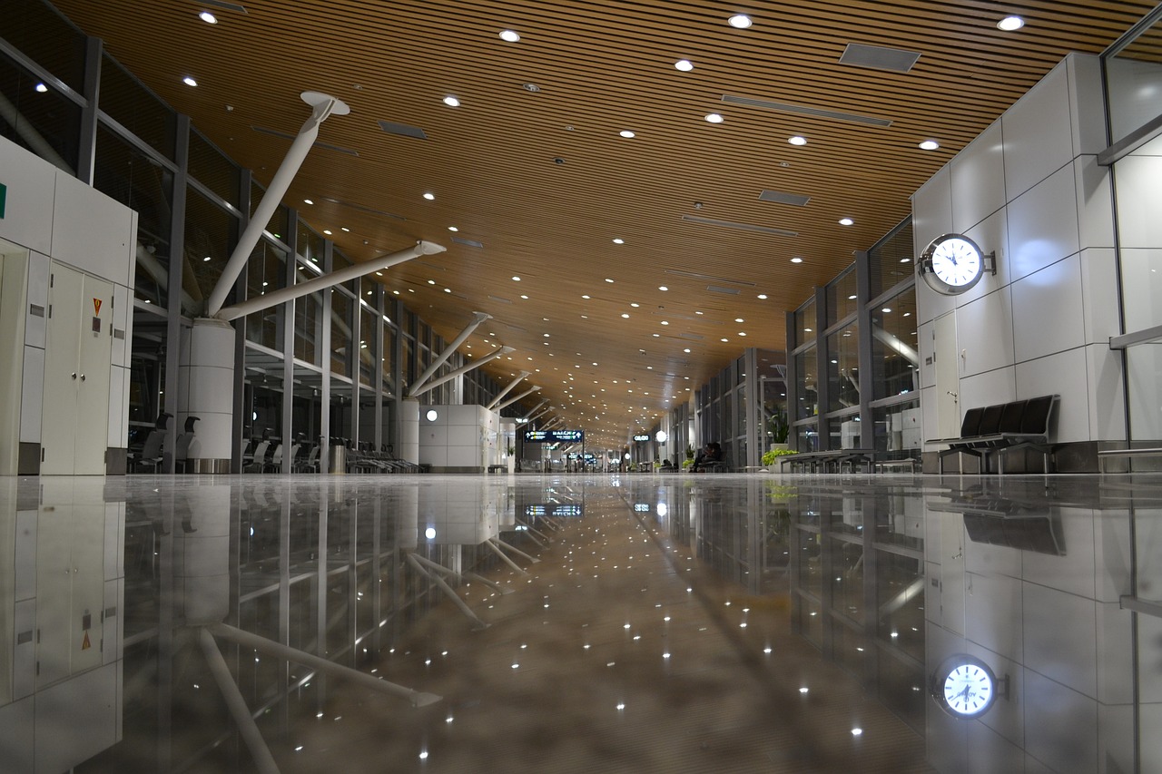 Interior of an airport terminal, KL International Airport at night.